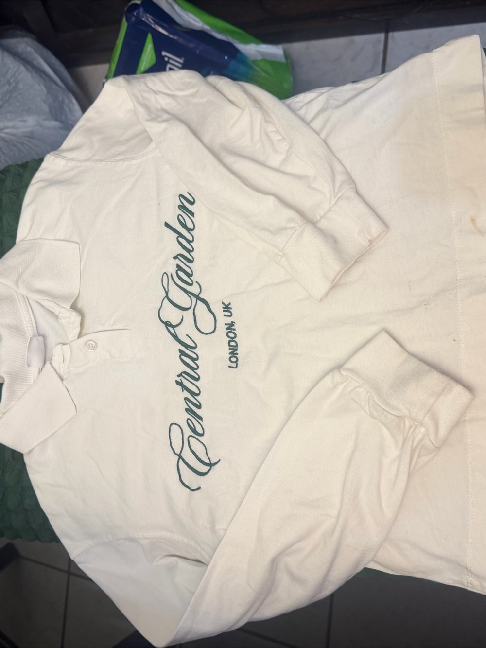 Zara Cream Long-Sleeve Polo with Green Script